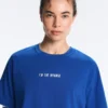 T-shirt court et carré en mélange de coton avec slogan T-shirt court et carré en mélange de coton avec slogan