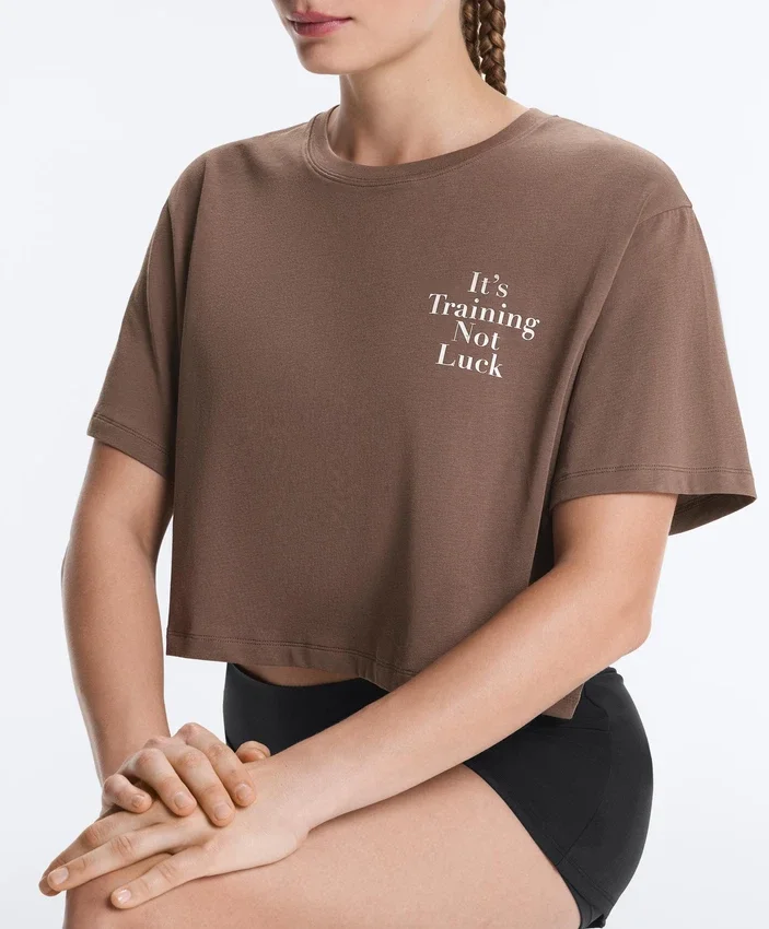 T-shirt court et carré en mélange de coton avec slogan T-shirt court et carré en mélange de coton avec slogan