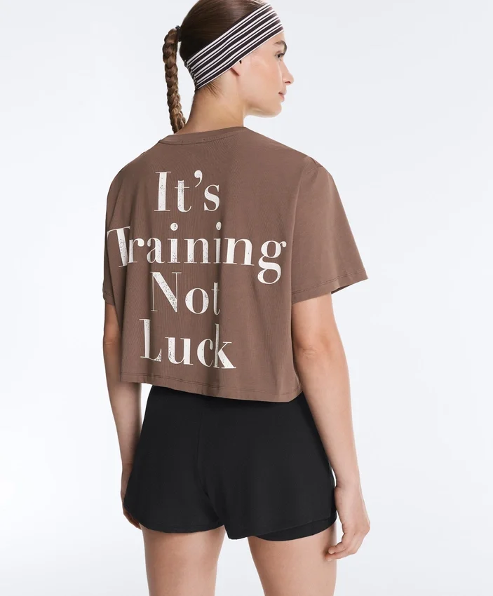 T-shirt court et carré en mélange de coton avec slogan T-shirt court et carré en mélange de coton avec slogan