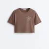 T-shirt court et carré en mélange de coton avec slogan T-shirt court et carré en mélange de coton avec slogan