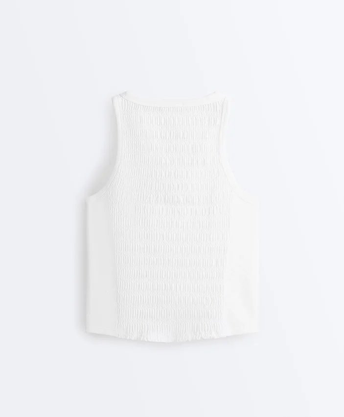 T-shirt sans manches smocké sans coutures T-shirt sans manches smocké sans coutures