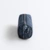 Trousse de toilette rayée avec nœud Trousse de toilette rayée avec nœud