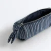 Trousse de toilette rayée avec nœud Trousse de toilette rayée avec nœud