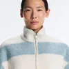 Veste aviateur en imitation peaux lainées rayée