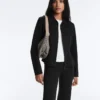 Veste à basque effet néoprène avec bordures côtelées Veste à basque effet néoprène avec bordures côtelées
