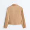 Veste à basque effet néoprène avec bordures côtelées Veste à basque effet néoprène avec bordures côtelées
