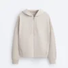 Veste à capuche avec détails en bord-côte et modal brossé Veste à capuche avec détails en bord-côte et modal brossé