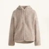 Veste à capuche en imitation peaux lainées