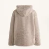 Veste à capuche en imitation peaux lainées