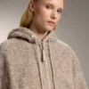 Veste à capuche en imitation peaux lainées