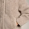Veste à capuche en imitation peaux lainées