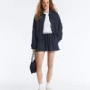 Veste à col polo en piqué à fines rayures avec coton Veste à col polo en piqué à fines rayures avec coton