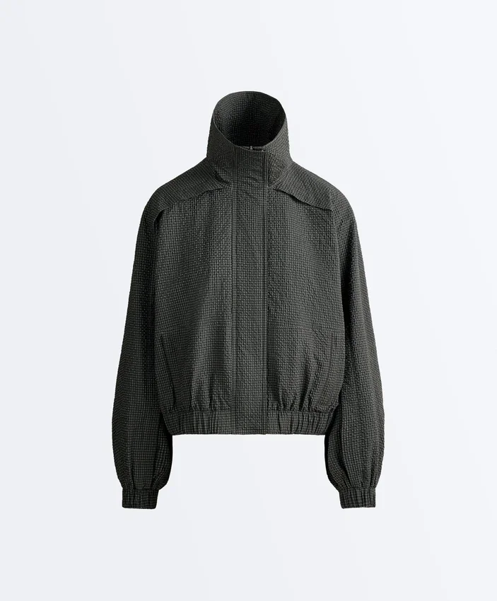 Veste de survêtement en nylon à carreaux déperlant Veste de survêtement en nylon à carreaux déperlant