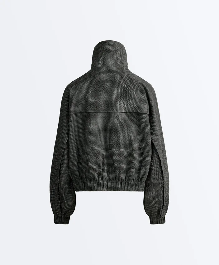 Veste de survêtement en nylon à carreaux déperlant Veste de survêtement en nylon à carreaux déperlant