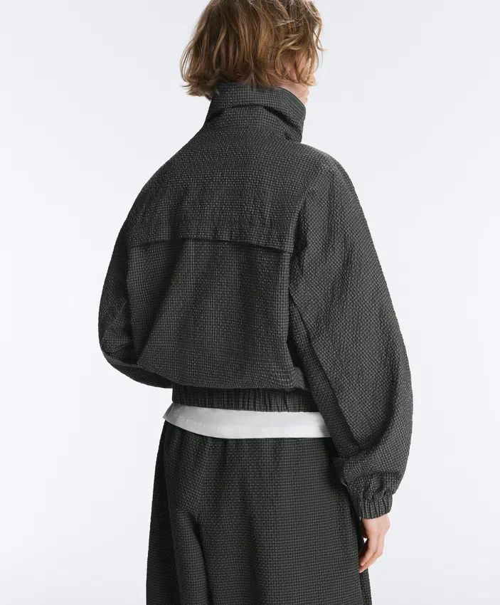 Veste de survêtement en nylon à carreaux déperlant Veste de survêtement en nylon à carreaux déperlant