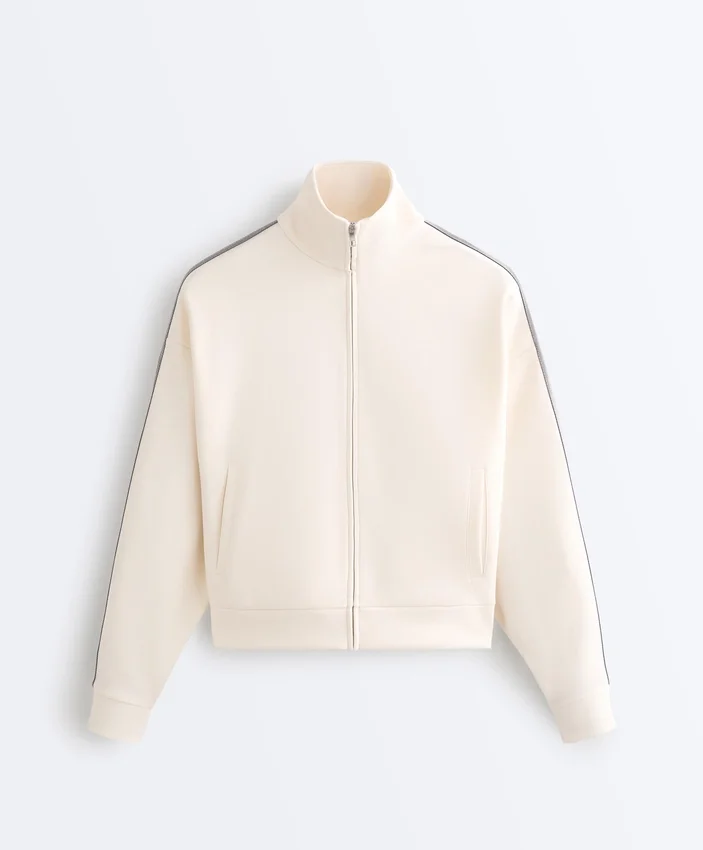 Veste en coton piqué avec bande à chevrons sur les côtés Veste en coton piqué avec bande à chevrons sur les côtés