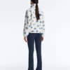 Veste en fausse peau lainée à motif floral Veste en fausse peau lainée à motif floral