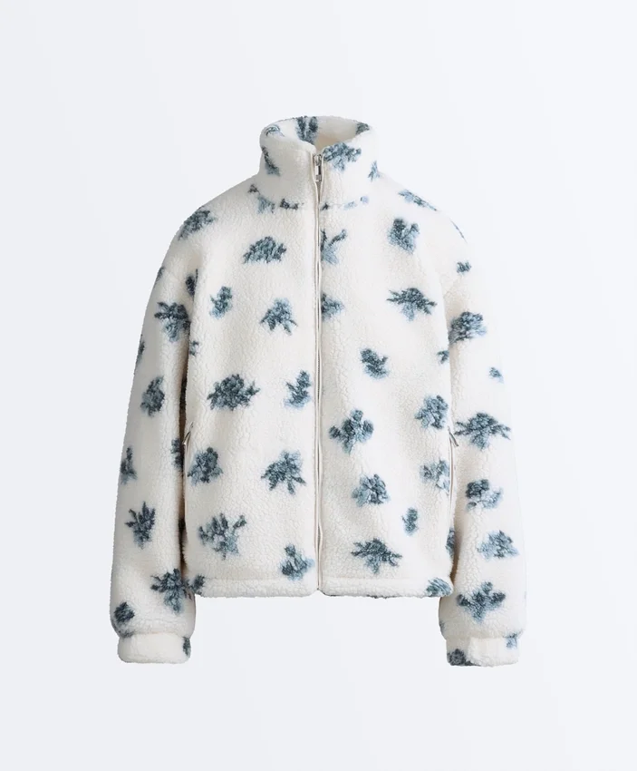 Veste en fausse peau lainée à motif floral Veste en fausse peau lainée à motif floral