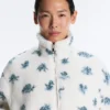 Veste en fausse peau lainée à motif floral Veste en fausse peau lainée à motif floral