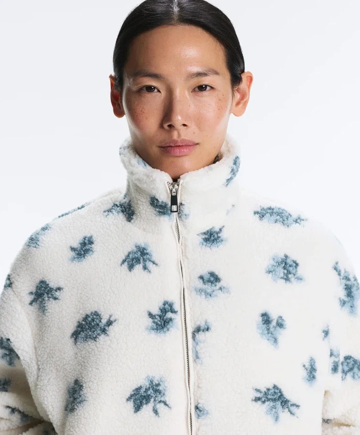 Veste en fausse peau lainée à motif floral Veste en fausse peau lainée à motif floral
