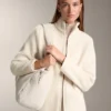 Veste en imitation peaux lainées