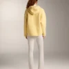 Veste en imitation peaux lainées avec capuche