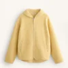 Veste en imitation peaux lainées avec capuche