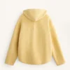 Veste en imitation peaux lainées avec capuche