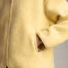 Veste en imitation peaux lainées avec capuche