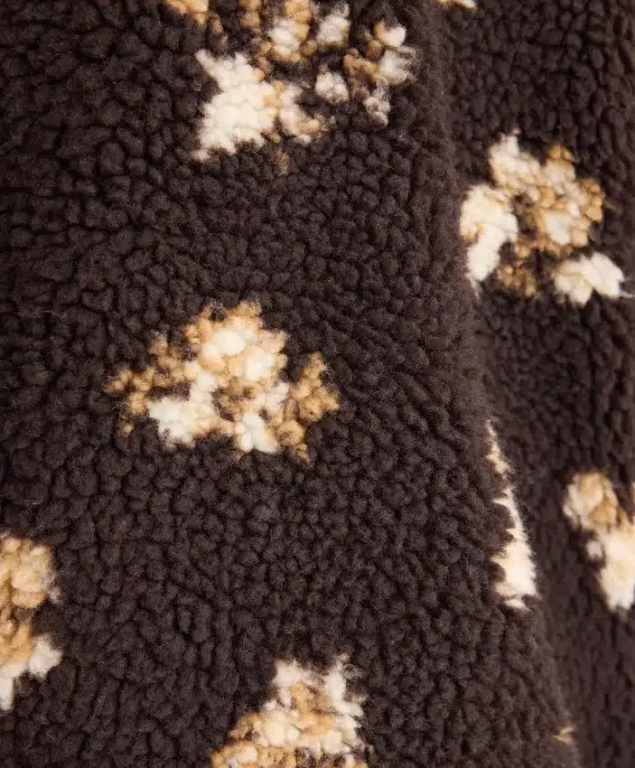 Veste en imitation peaux lainées à imprimé floral Veste en imitation peaux lainées à imprimé floral