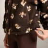 Veste en imitation peaux lainées à imprimé floral Veste en imitation peaux lainées à imprimé floral