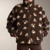 Veste en imitation peaux lainées à imprimé floral Veste en imitation peaux lainées à imprimé floral