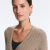 Veste en maille côtelée avec fermeture à nouer sur le côté Veste en maille côtelée avec fermeture à nouer sur le côté