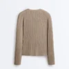 Veste en maille côtelée avec fermeture à nouer sur le côté Veste en maille côtelée avec fermeture à nouer sur le côté