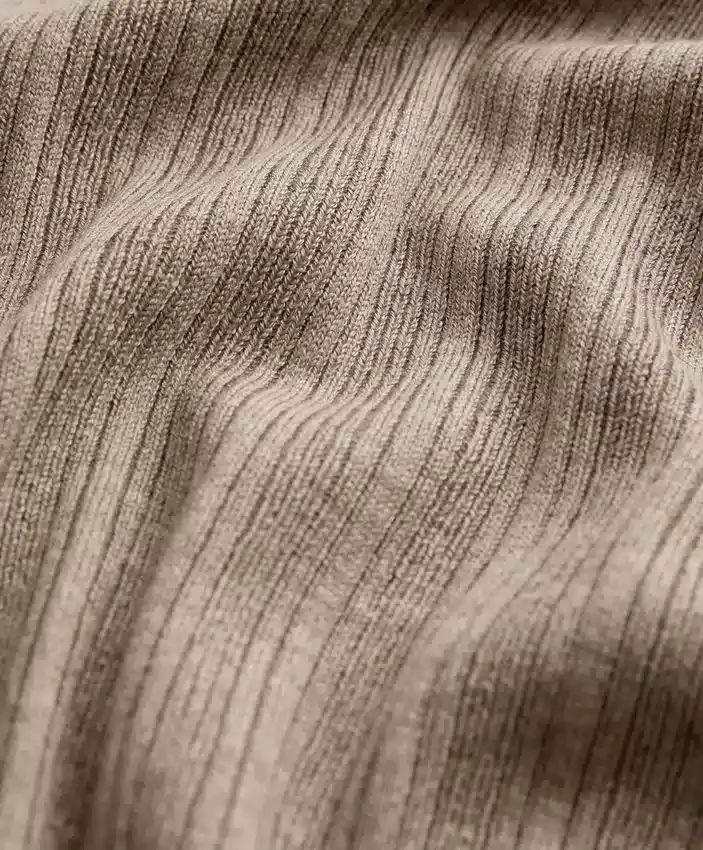 Veste en maille côtelée avec fermeture à nouer sur le côté Veste en maille côtelée avec fermeture à nouer sur le côté