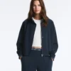 Veste en piqué avec passepoil contrasté en coton Veste en piqué avec passepoil contrasté en coton
