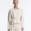 Veste en piqué de coton avec ceinture Veste en piqué de coton avec ceinture
