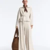 Veste en piqué de coton avec ceinture Veste en piqué de coton avec ceinture