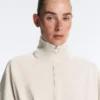 Veste en piqué de coton avec ceinture Veste en piqué de coton avec ceinture