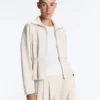 Veste en piqué de coton avec ceinture Veste en piqué de coton avec ceinture