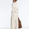 Veste en piqué de coton avec ceinture Veste en piqué de coton avec ceinture