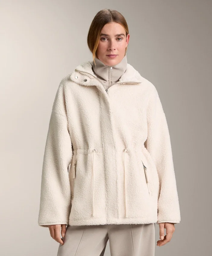 Veste en simili-peaux lainées à taille ajustable Veste en simili-peaux lainées à taille ajustable