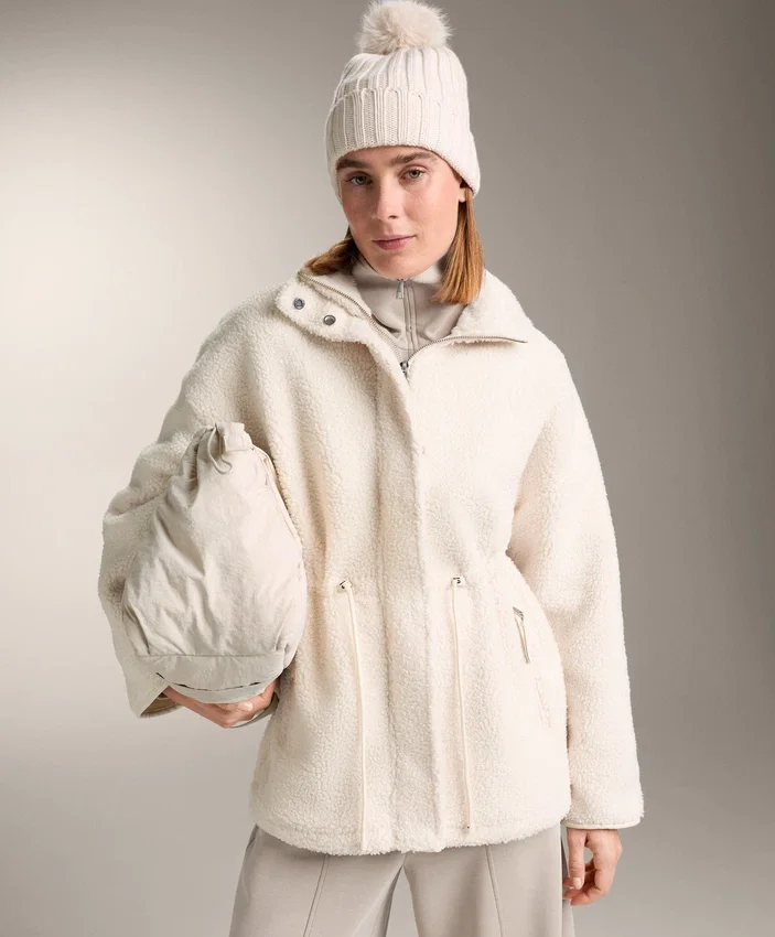 Veste en simili-peaux lainées à taille ajustable Veste en simili-peaux lainées à taille ajustable