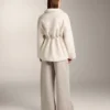Veste en simili-peaux lainées à taille ajustable Veste en simili-peaux lainées à taille ajustable