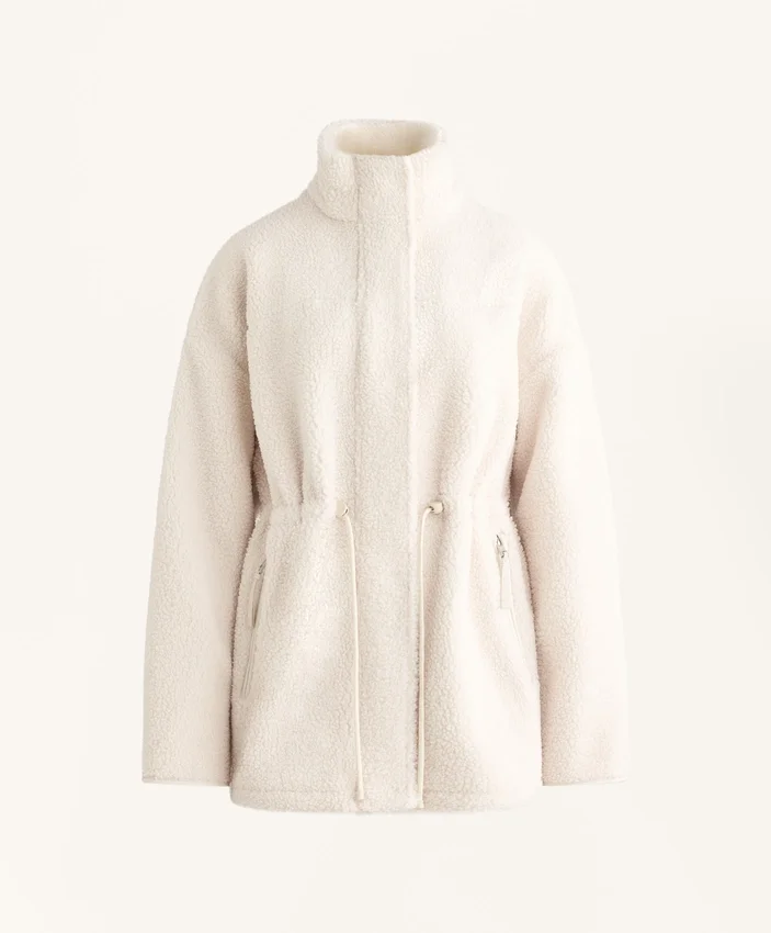 Veste en simili-peaux lainées à taille ajustable Veste en simili-peaux lainées à taille ajustable