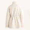 Veste en simili-peaux lainées à taille ajustable Veste en simili-peaux lainées à taille ajustable