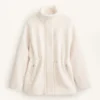 Veste en simili-peaux lainées à taille ajustable Veste en simili-peaux lainées à taille ajustable