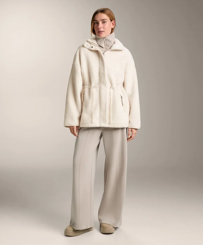 Veste en simili-peaux lainées à taille ajustable Veste en simili-peaux lainées à taille ajustable