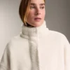 Veste en simili-peaux lainées à taille ajustable Veste en simili-peaux lainées à taille ajustable