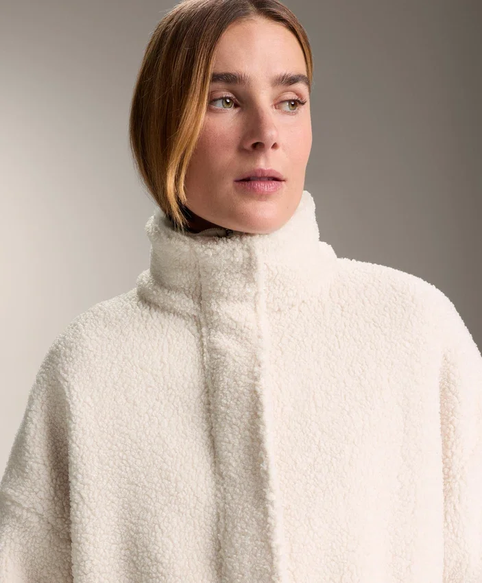 Veste en simili-peaux lainées à taille ajustable Veste en simili-peaux lainées à taille ajustable